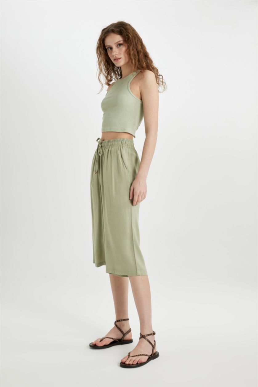 حريمي كاكي فاتح كابري كروب فيت فيسكوز بخصر عالي