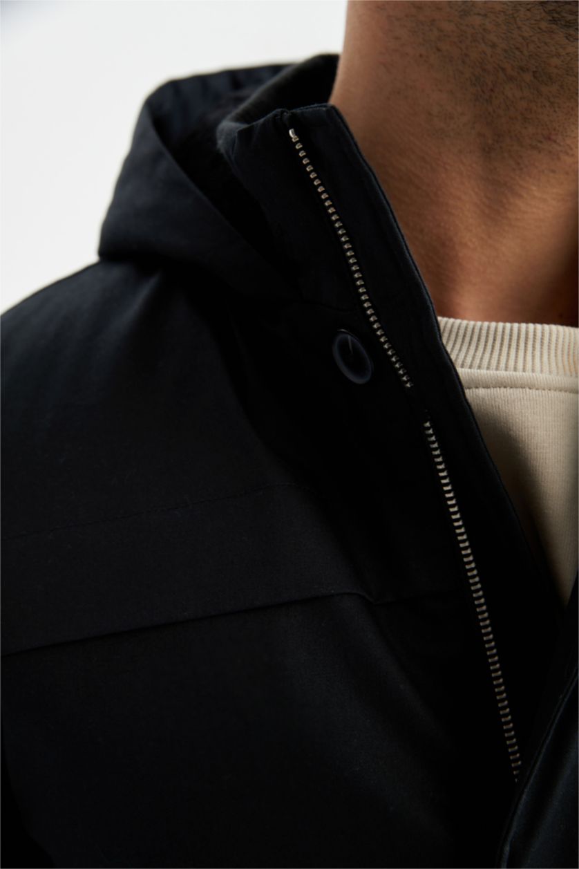 رجال أسود جاكيت طويل سليم فيت بغطاء للرأس مبطن بفرو إصطناعي