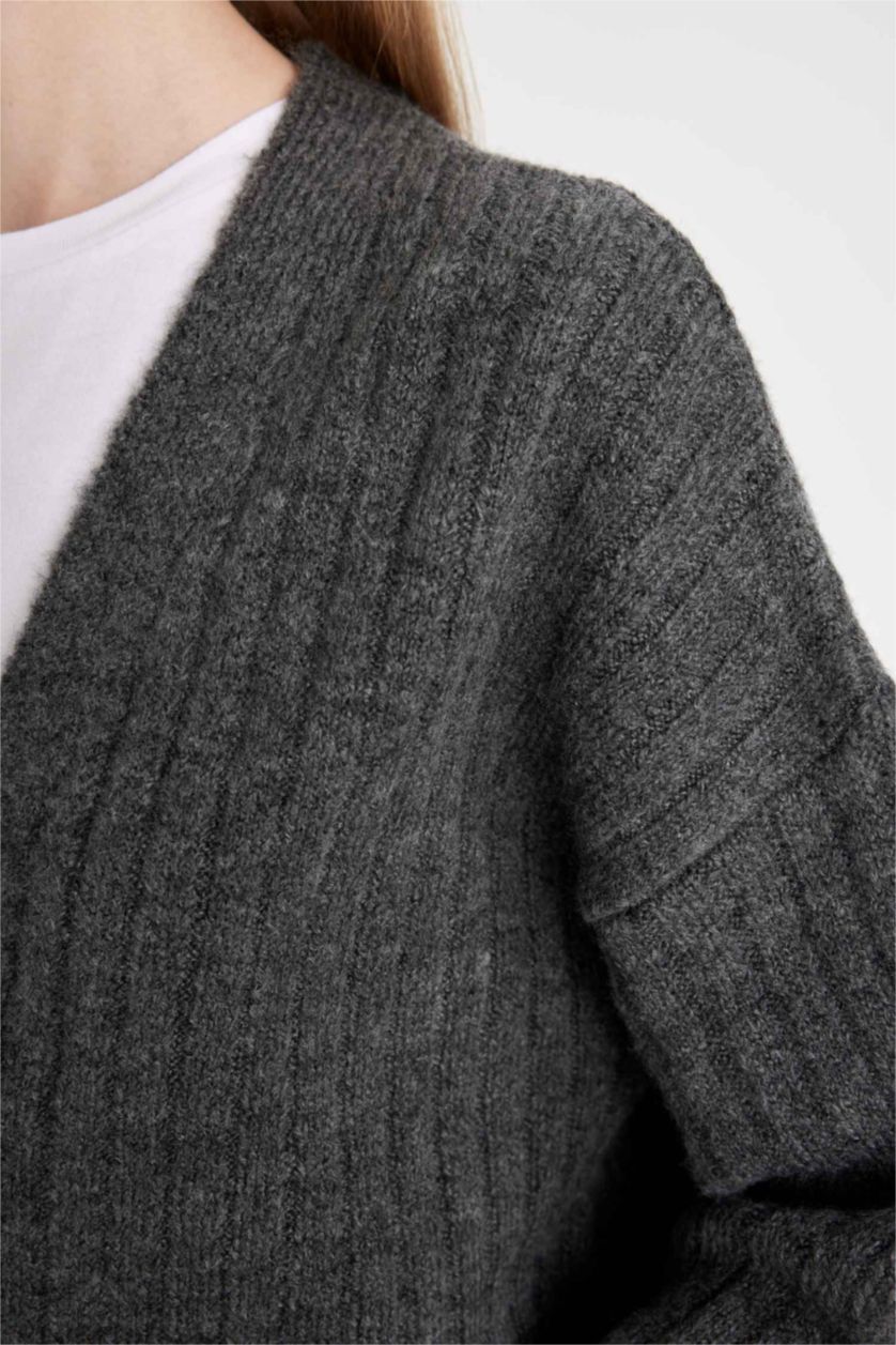 حريمي أنثرا كارديجان تريكو بيزك قصة عادية بياقة V