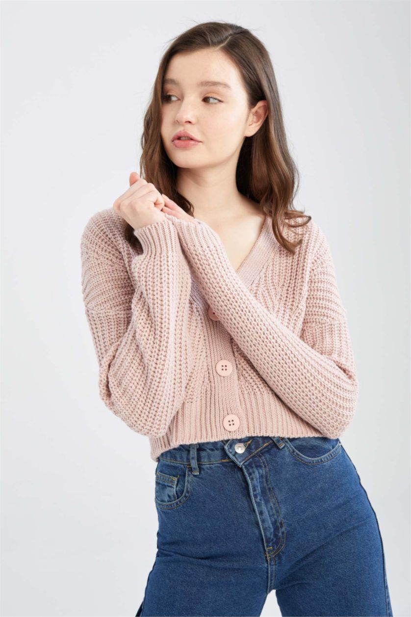نساء وردي فاتح جاكيت صوف قصة عادية بياقة V