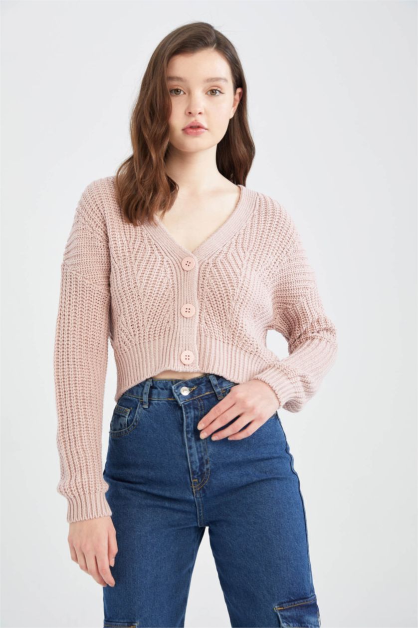 نساء وردي فاتح جاكيت صوف قصة عادية بياقة V