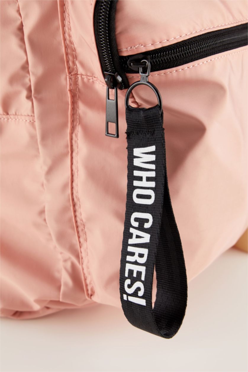 نساء زهري فاتح حقيبة ظهر مطبوعة بشعار