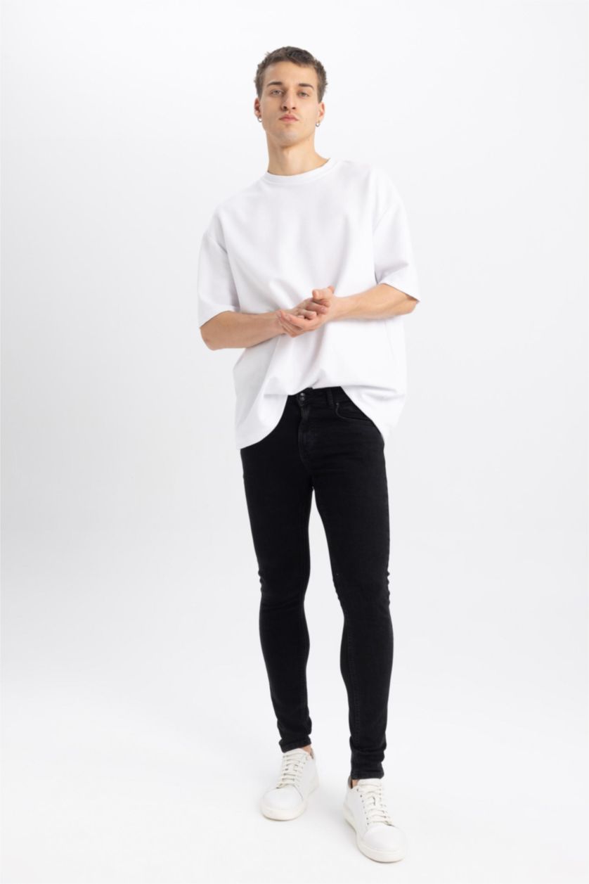 MAN Black Super Skinny Trousers