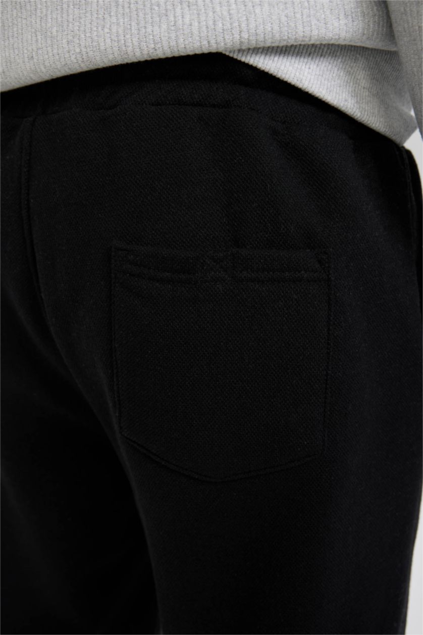 MAN Black Slim Fit Trousers
