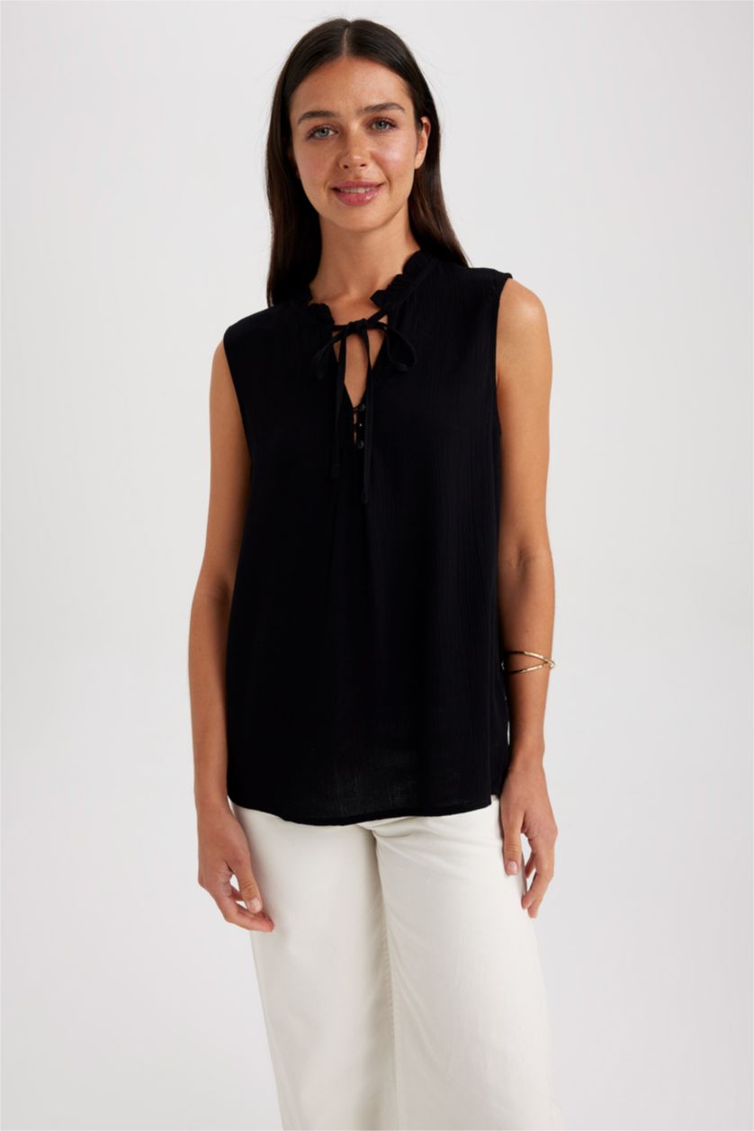 حريمي أسود بلوزة بدون أكمام بقصة عادية بياقة مكشكشة