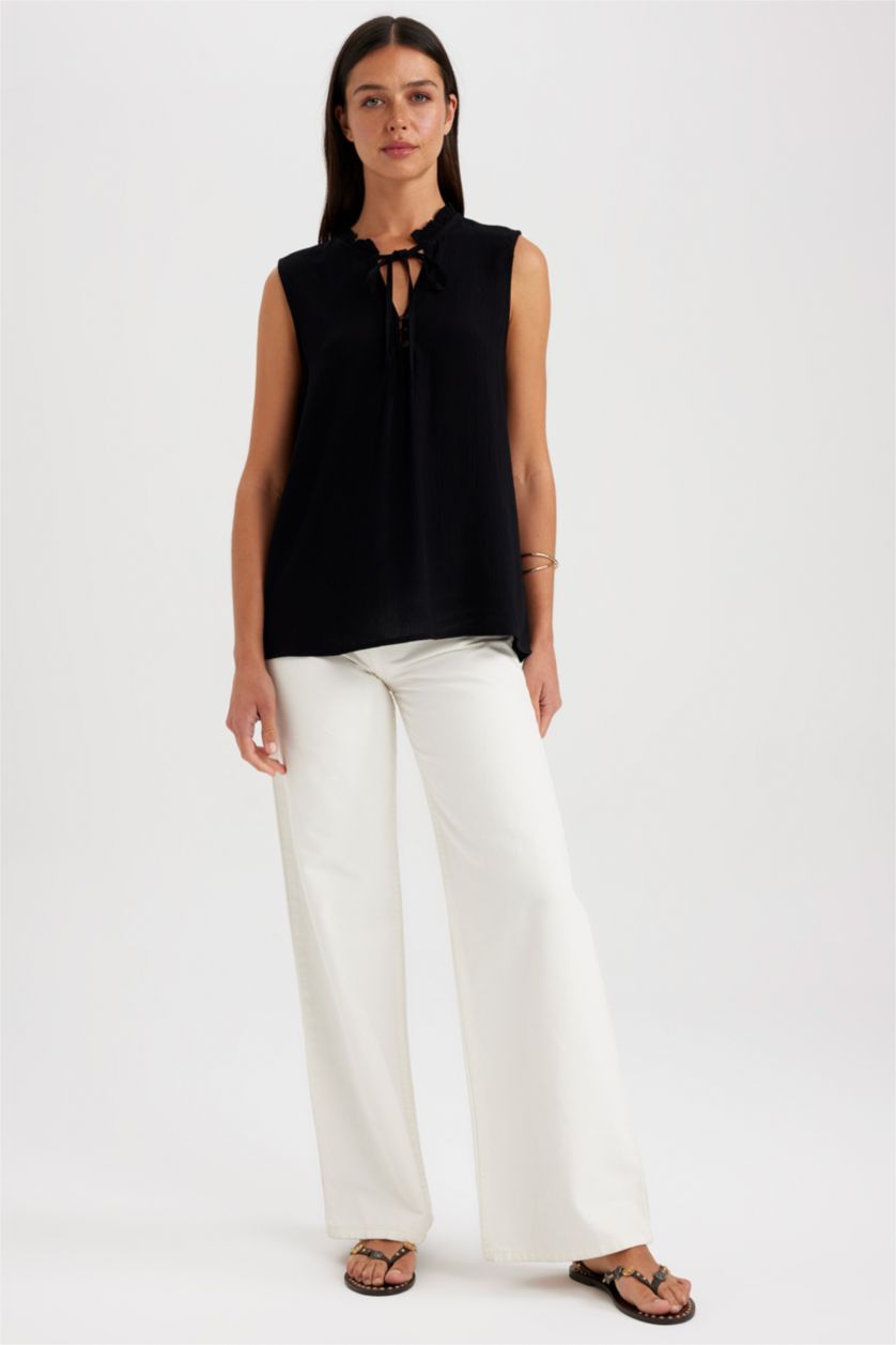 حريمي أسود بلوزة بدون أكمام بقصة عادية بياقة مكشكشة