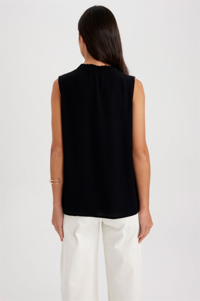 حريمي أسود بلوزة بدون أكمام بقصة عادية بياقة مكشكشة