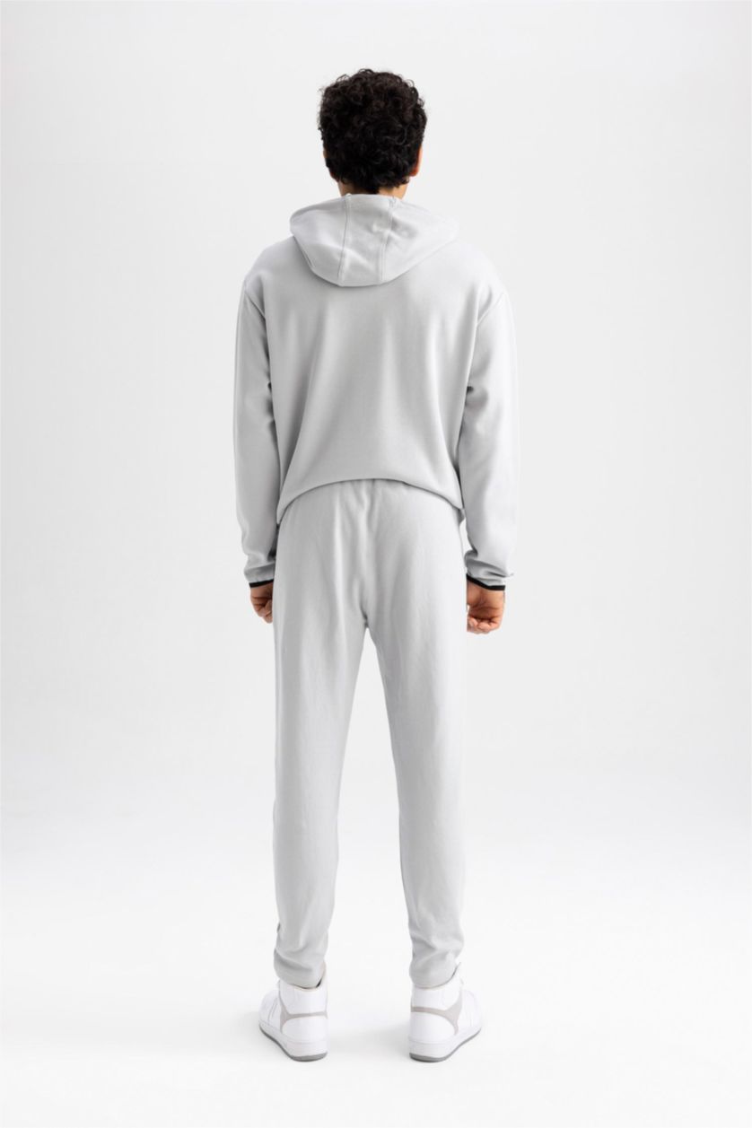 رجالي رمادي فاتح بنطلون سويت بانتس رياضي سليم فيت من DeFactoFit