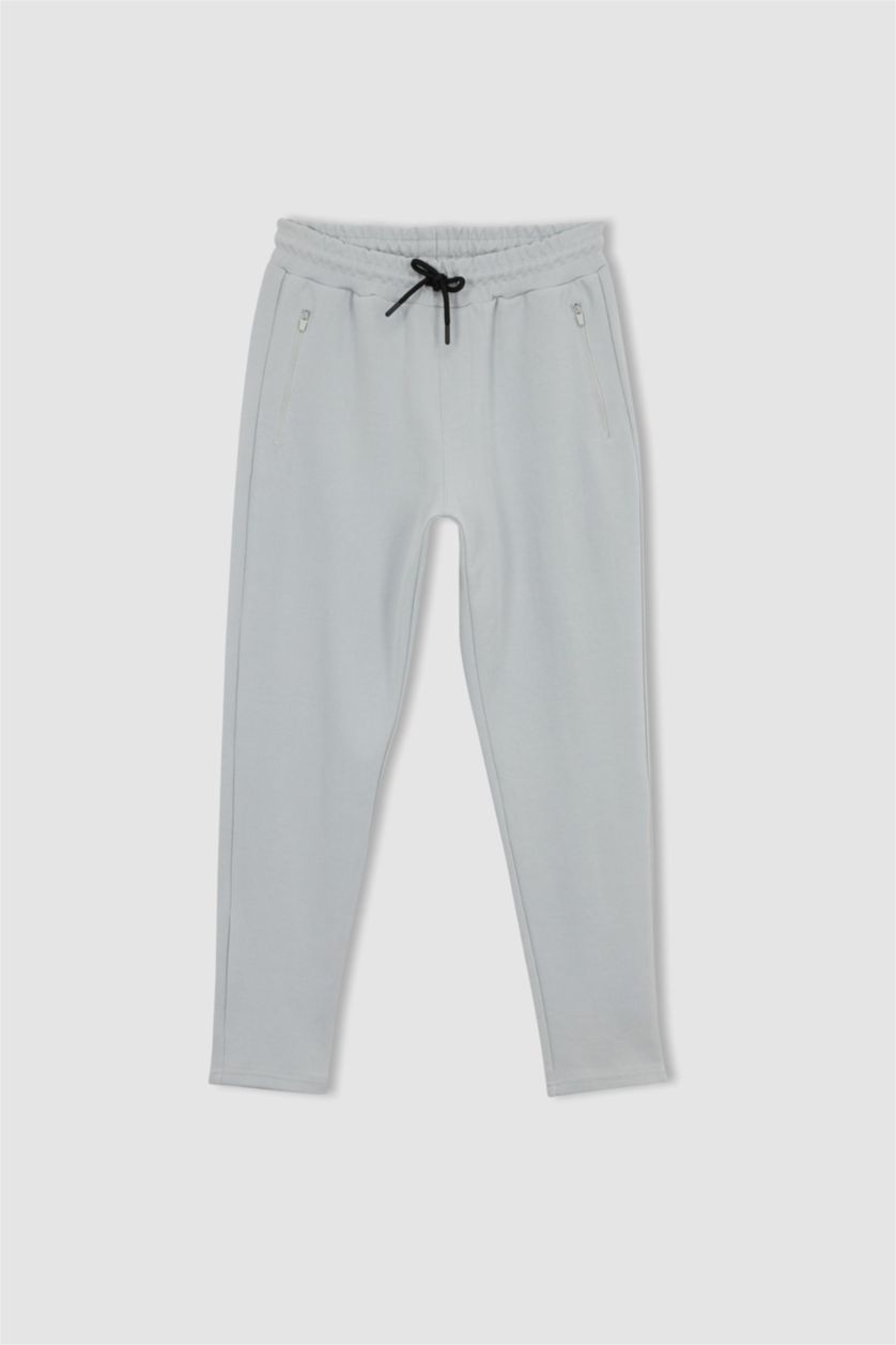 رجالي رمادي فاتح بنطلون سويت بانتس رياضي سليم فيت من DeFactoFit