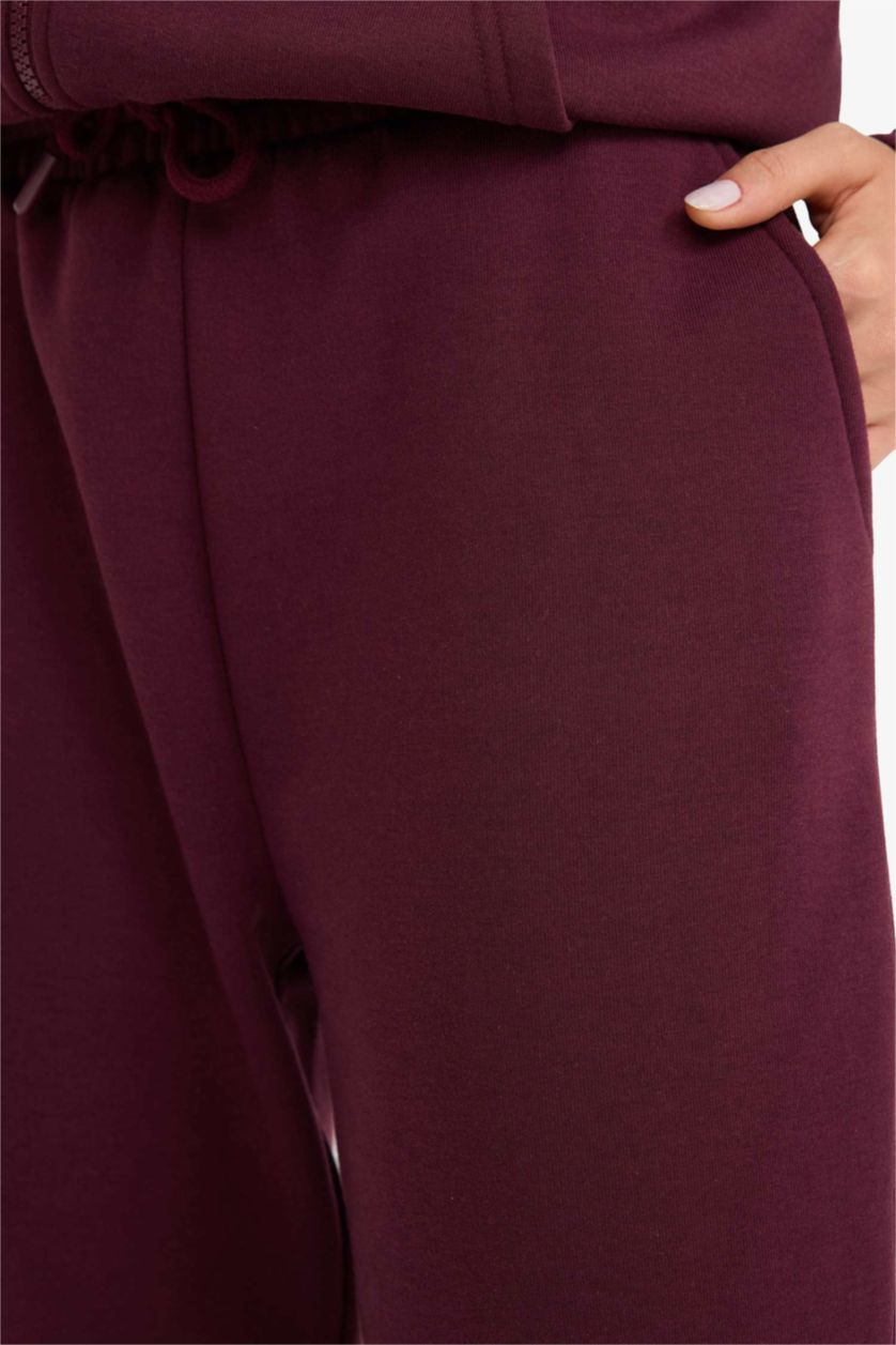 حريمي خمري بنطلون جوجر فيت تقيل بأستك من تحت خمري