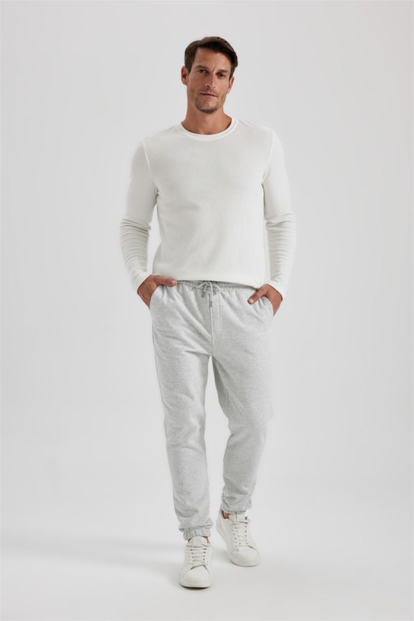 رجال ميلانج رمادي فاتح بنطلون بجامة رياضي محبوك سليم فيت برجل مطاطي