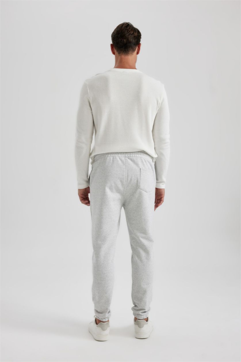 رجال ميلانج رمادي فاتح بنطلون بجامة رياضي محبوك سليم فيت برجل مطاطي