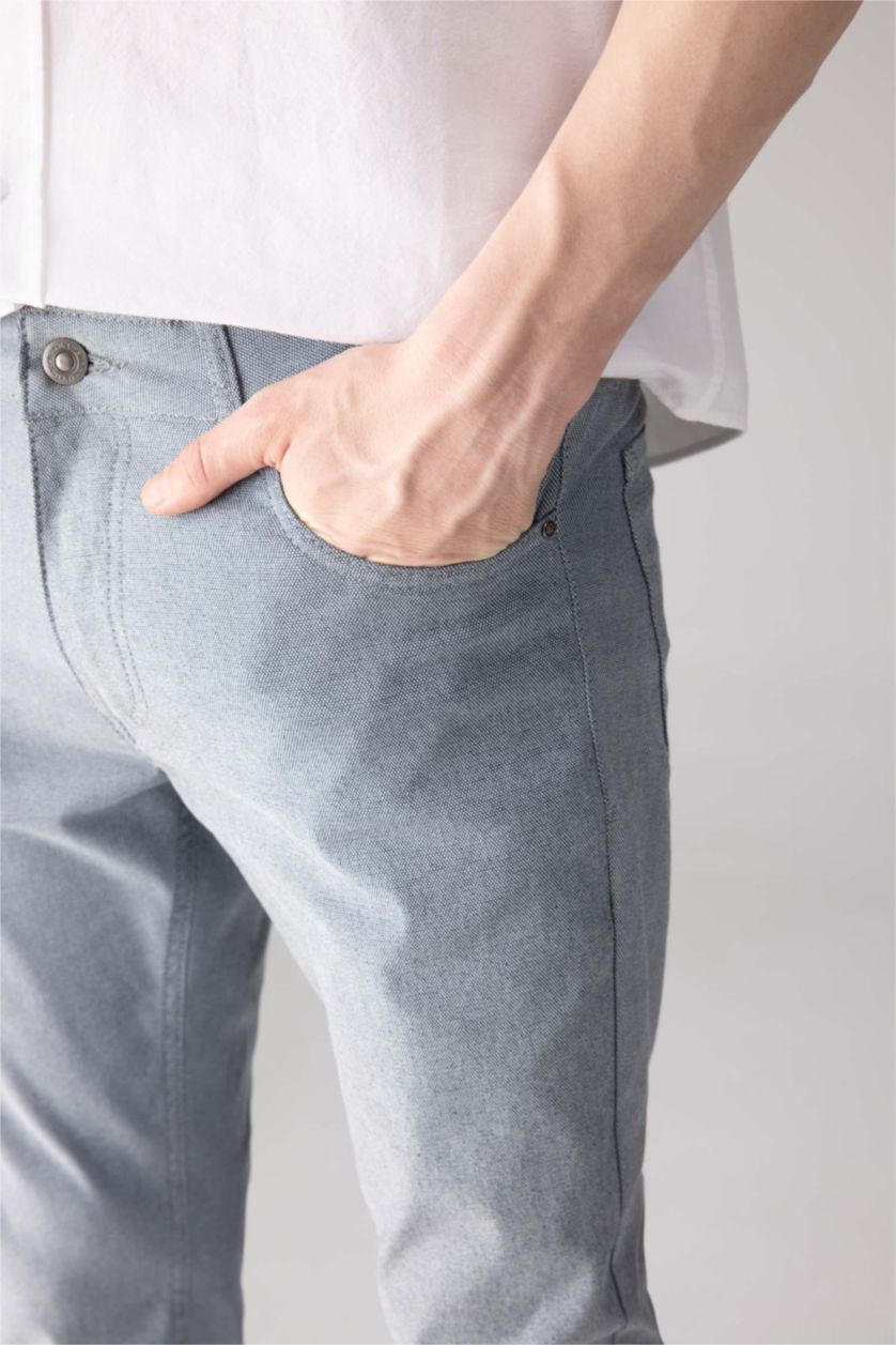MAN Light Indigo Slim Fit Super Skinny Hem Trousers