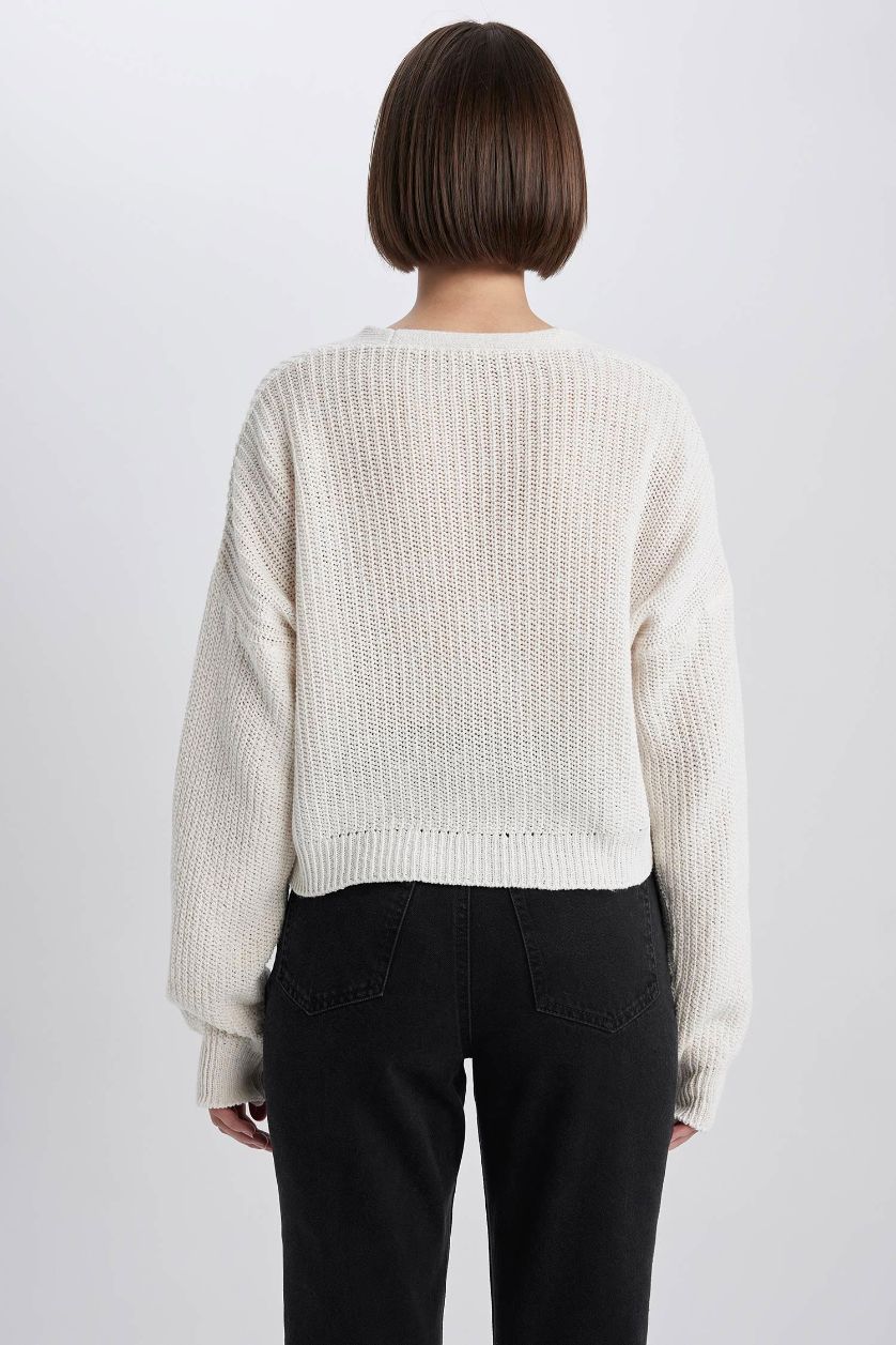 نساء بيج فاتح جاكيت قصة عادية بياقة V