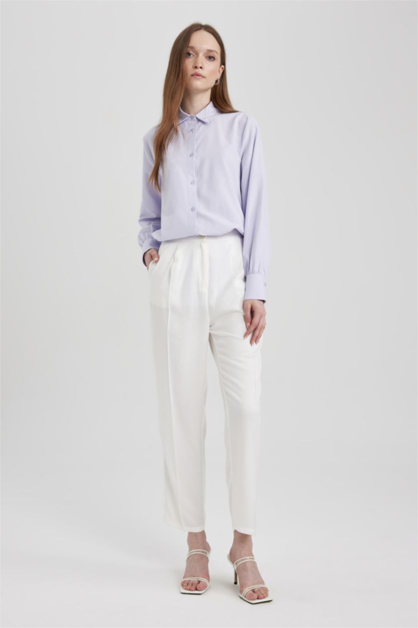 حريمي بيج فاتح بنطلون كاجوال بقصة عادية