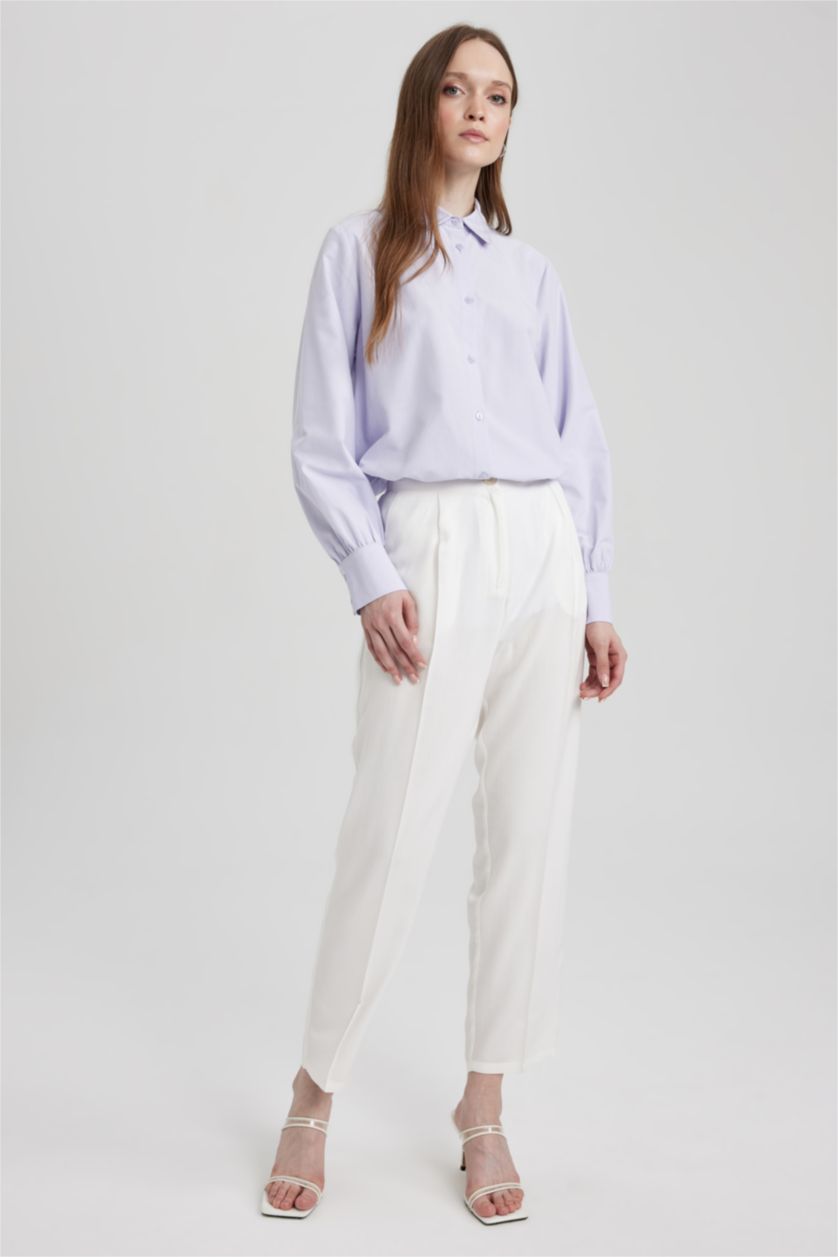 حريمي بيج فاتح بنطلون كاجوال بقصة عادية