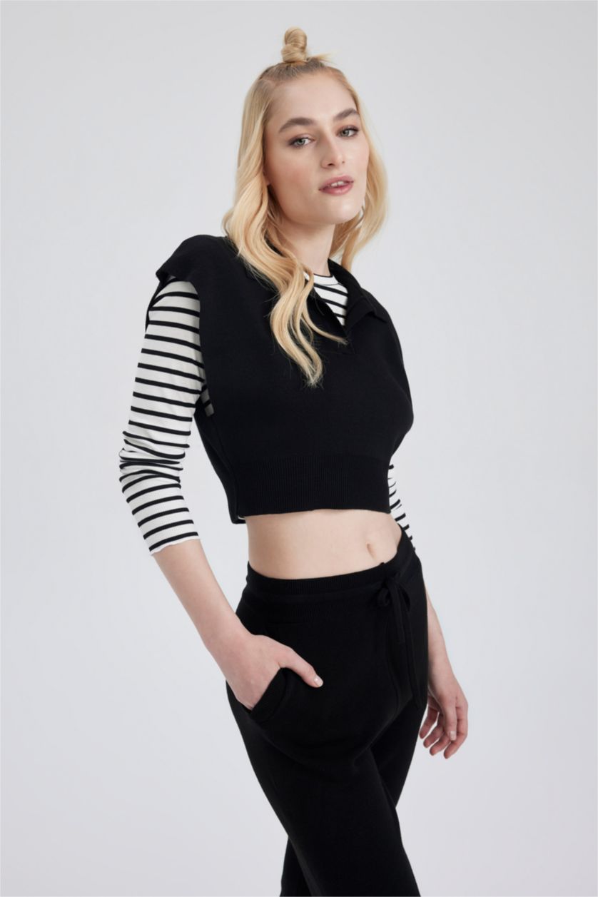 FEMME Noir Pull sans manches en tricot à Col Polo et Coupe régulière