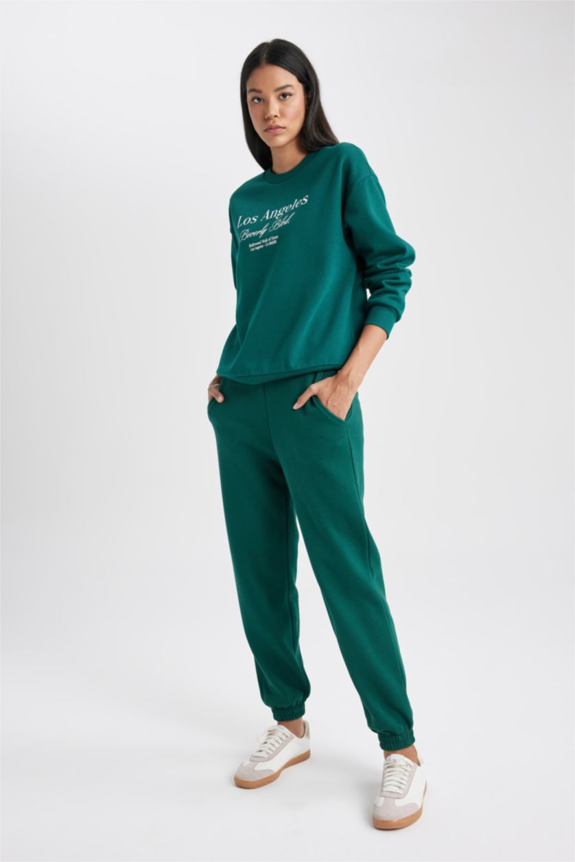 حريمي أخضر غامق بنطلون سويت بانتس جوجر تقيل بأستك من تحت