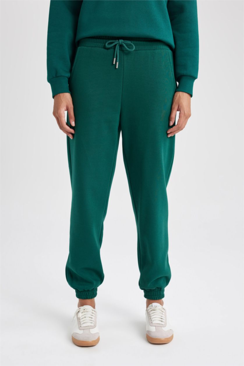 حريمي أخضر غامق بنطلون سويت بانتس جوجر تقيل بأستك من تحت