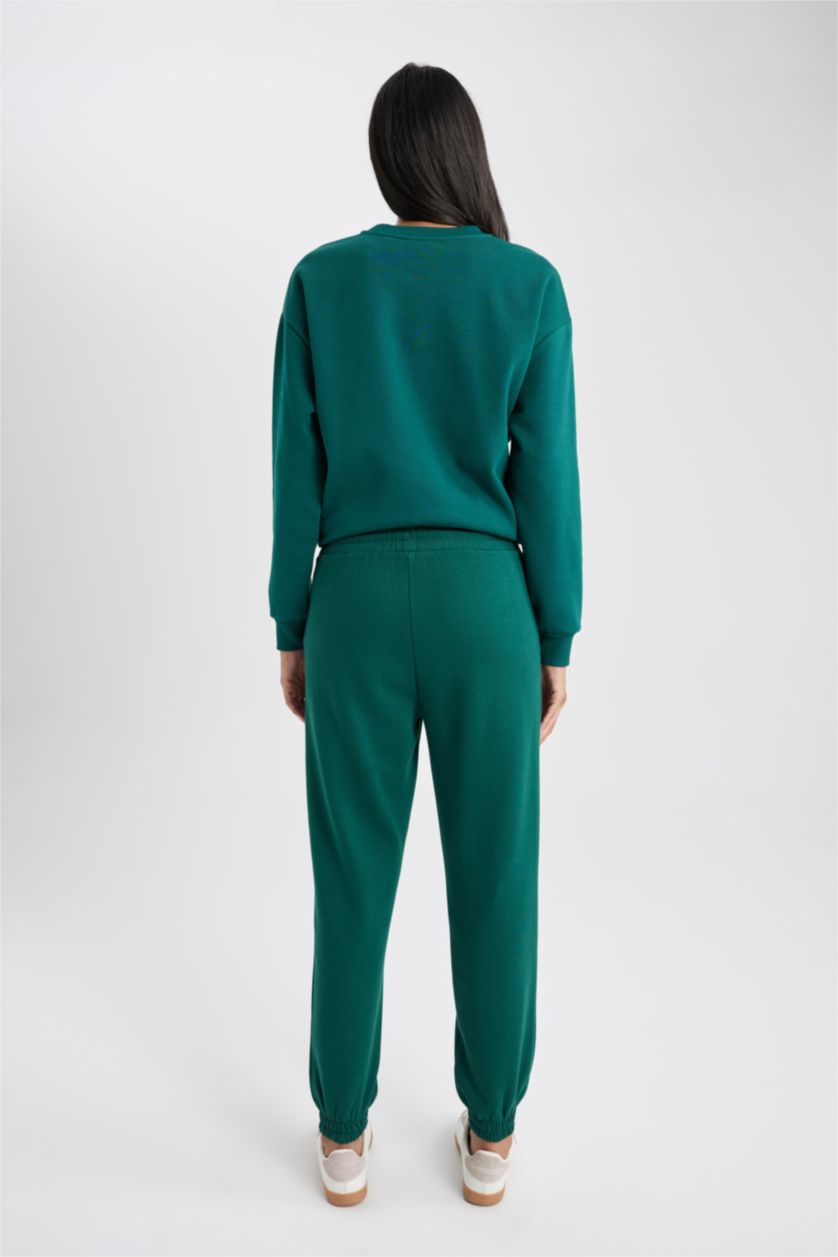حريمي أخضر غامق بنطلون سويت بانتس جوجر تقيل بأستك من تحت