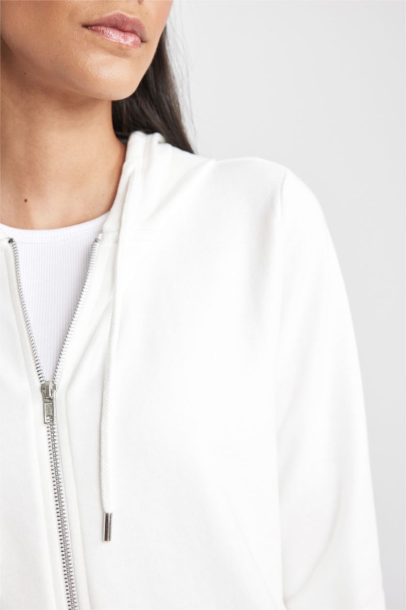 نساء بيج فاتح سويتر قماش رقيق قصة عادية