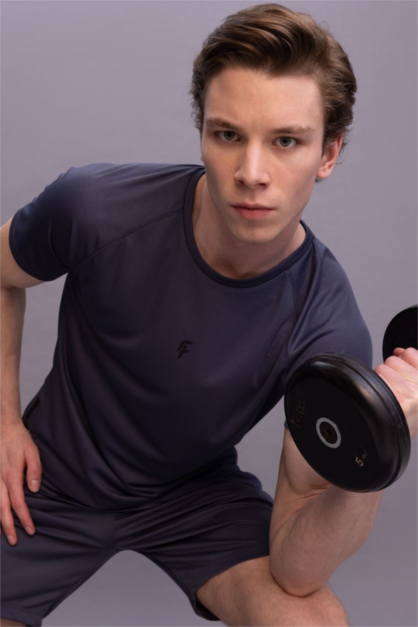 رجال نيلي تيشيرت رياضي سليم فيت بياخة مستديرة