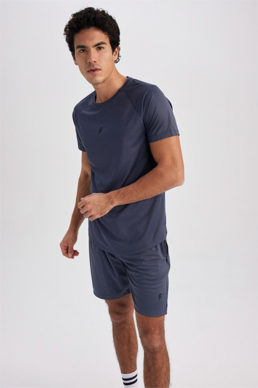 رجال نيلي تيشيرت رياضي سليم فيت بياخة مستديرة