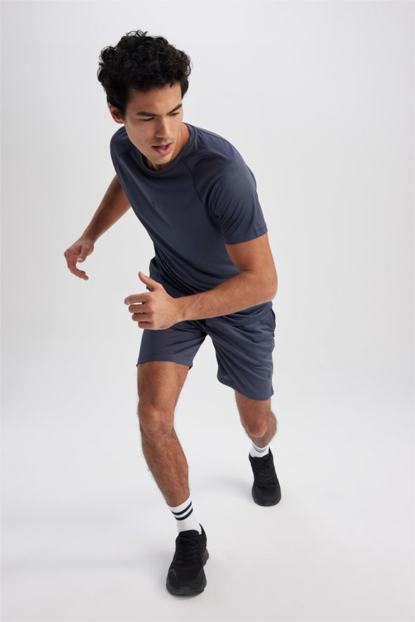 رجال نيلي تيشيرت رياضي سليم فيت بياخة مستديرة