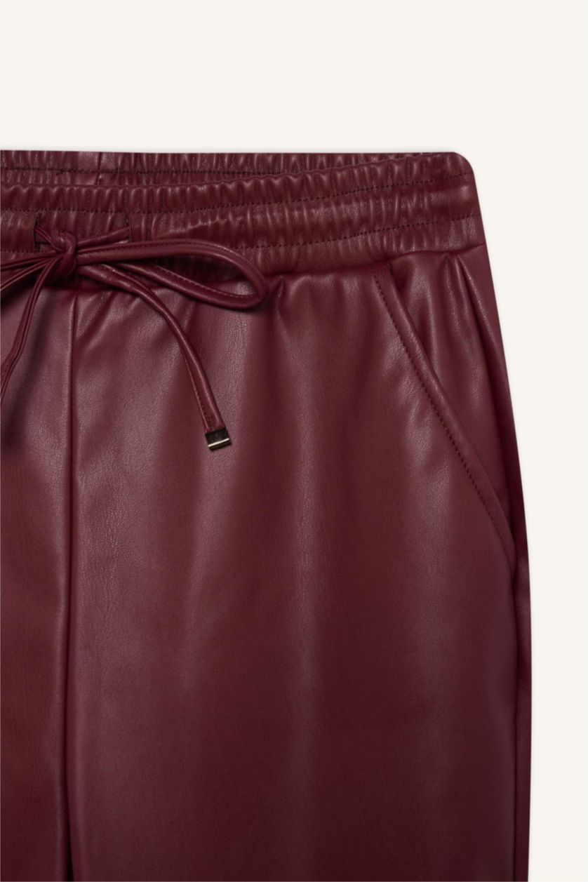 Kadın Bordo Jogger Cepli Yüksek Bel Standart Paça Suni Deri Pantolon