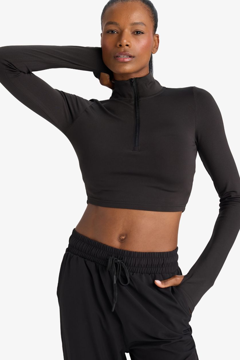 FEMME Noir T-shirt de sport slim à manches longues et col montant zippé de DeFactoFit