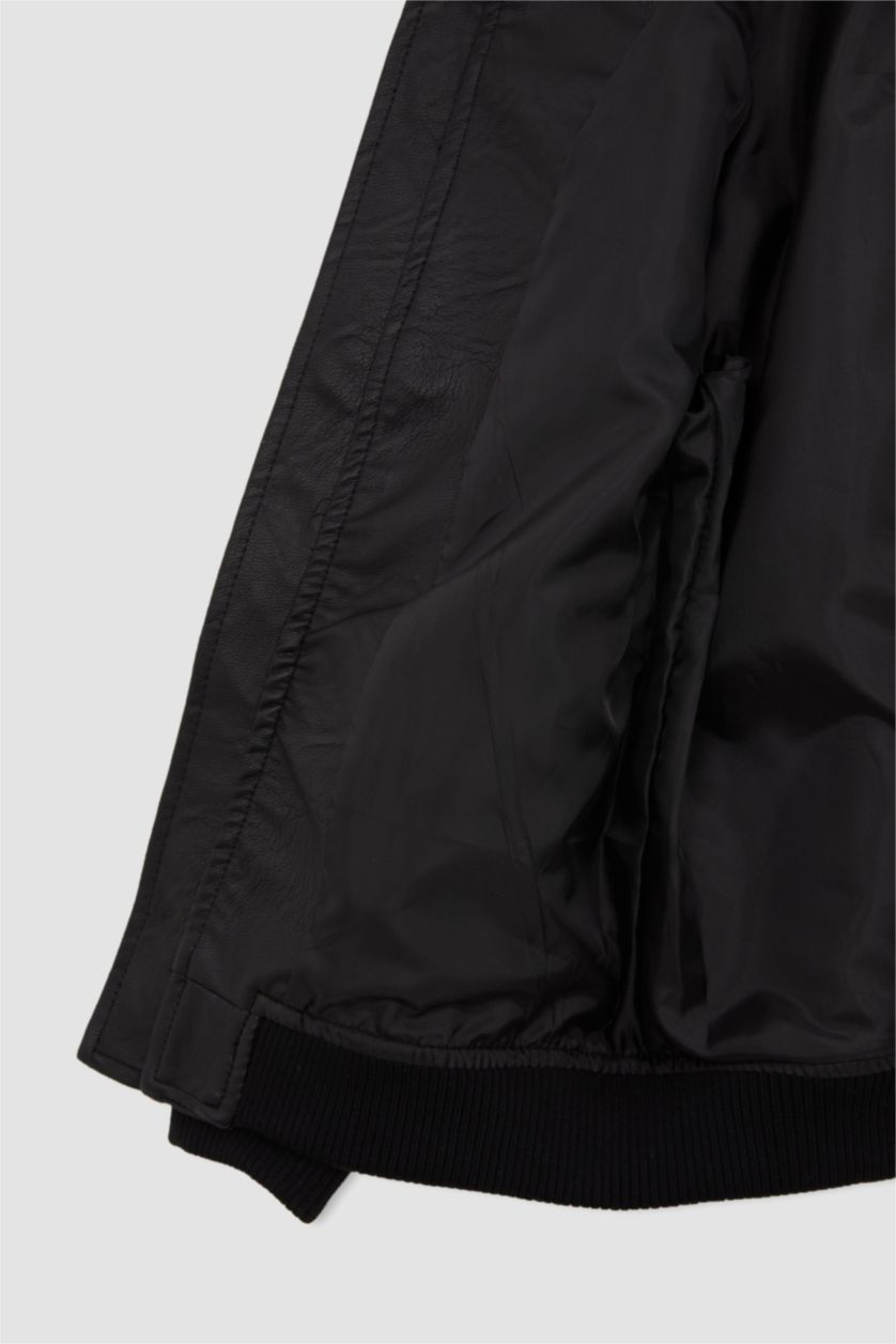 أولاد أسود جاكيت ولادي جلد صناعي