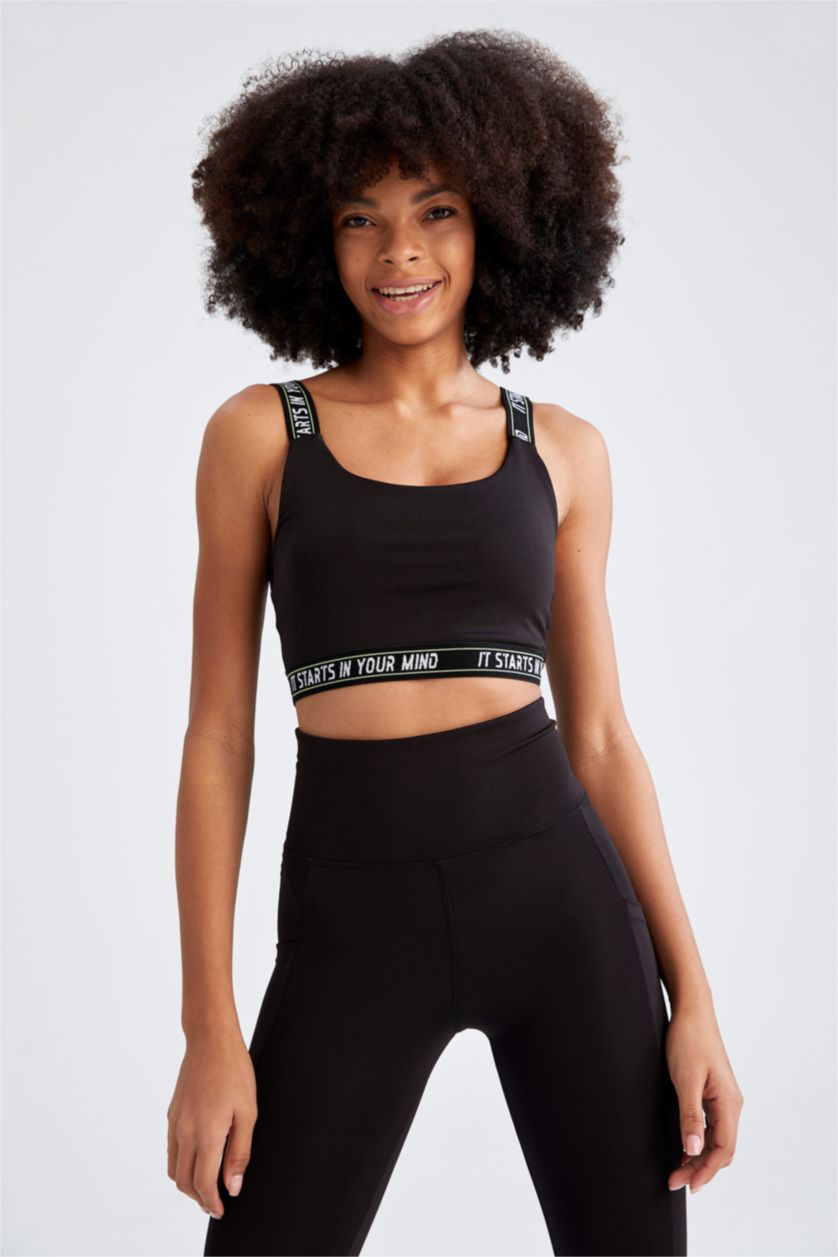 Woman Black Strappy Slogan Print Sports Bra