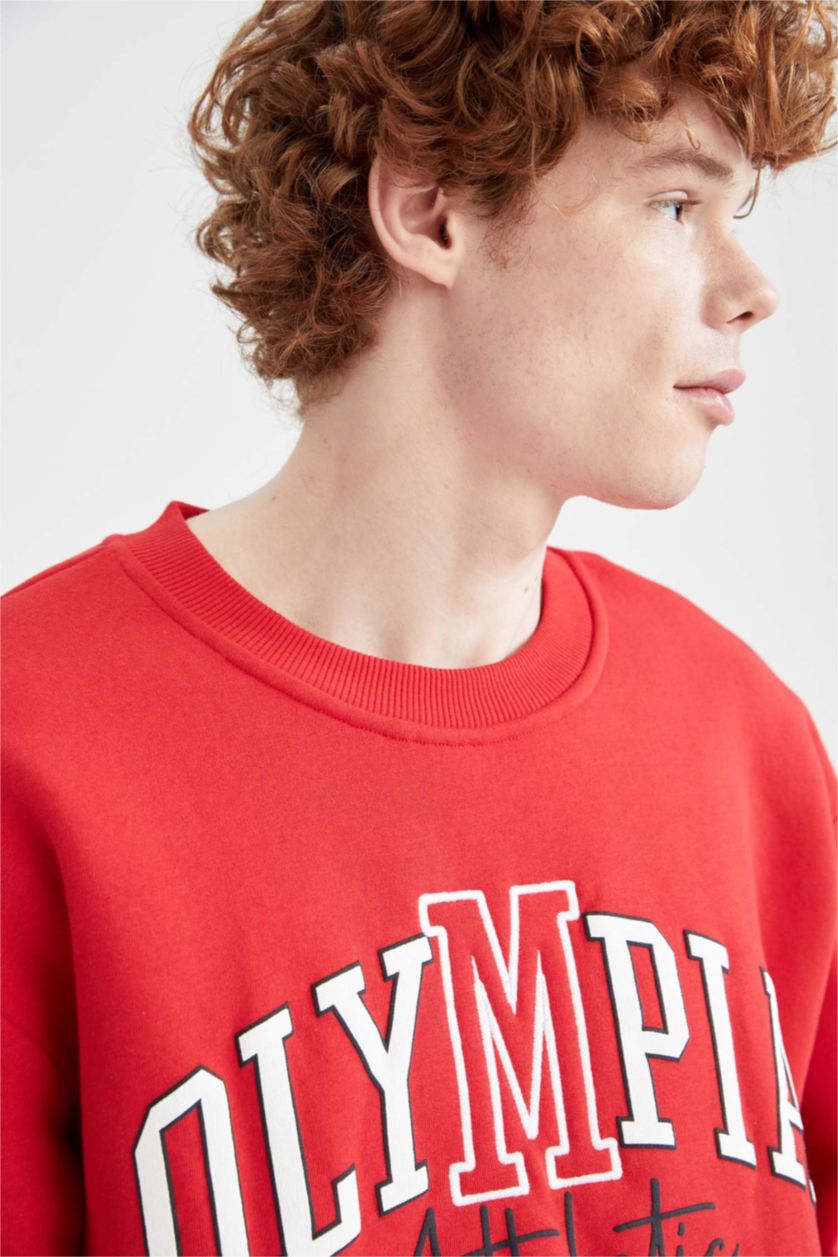 HOMME Rouge Sweat-shirt oversize à manches longues et col ras du cou imprimé