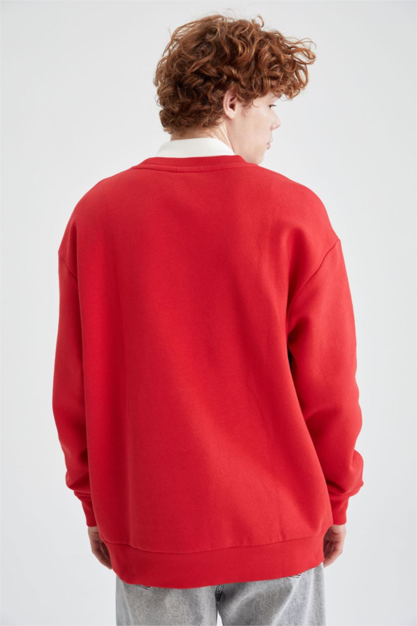 HOMME Rouge Sweat-shirt oversize à manches longues et col ras du cou imprimé