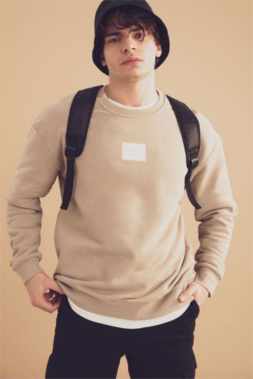 HOMME Beige Sweat-shirt à manches longues imprimé à col ras du cou et coupe carrée