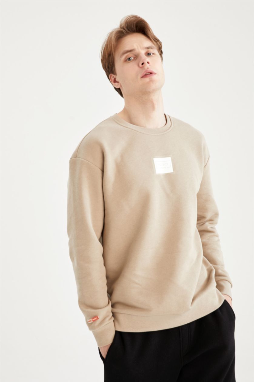 HOMME Beige Sweat-shirt à manches longues imprimé à col ras du cou et coupe carrée