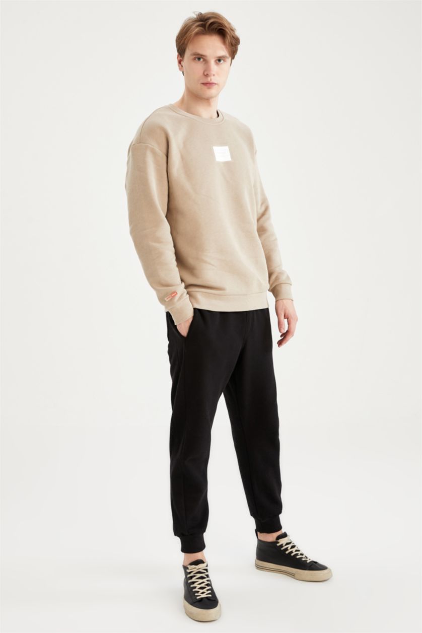 HOMME Beige Sweat-shirt à manches longues imprimé à col ras du cou et coupe carrée
