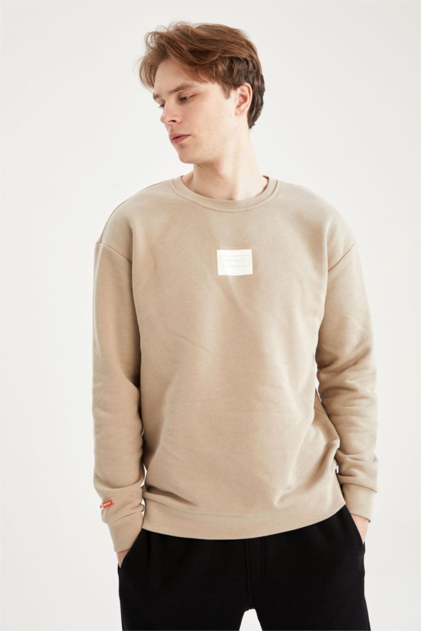 HOMME Beige Sweat-shirt à manches longues imprimé à col ras du cou et coupe carrée