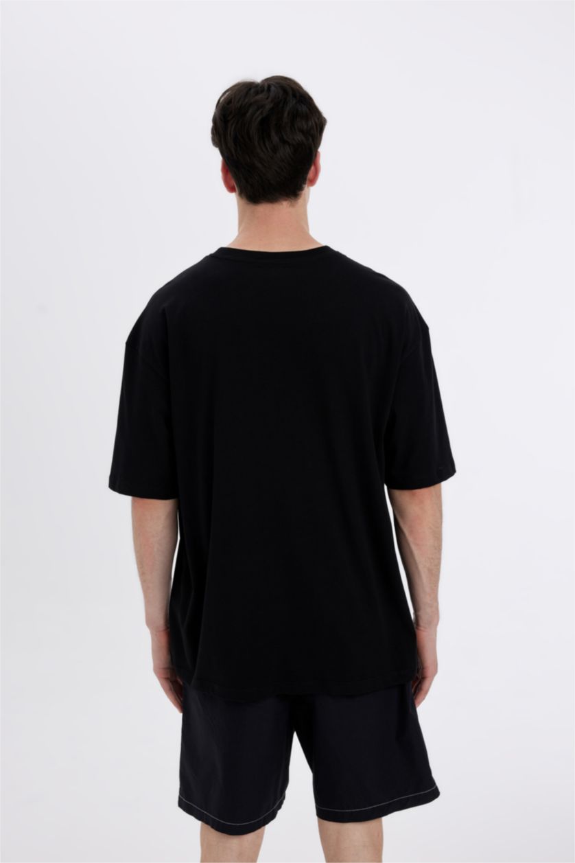 رجال أسود تي شيرت بأكمام قصيرة مطبوع بياقة مستديرة اوفر سايز