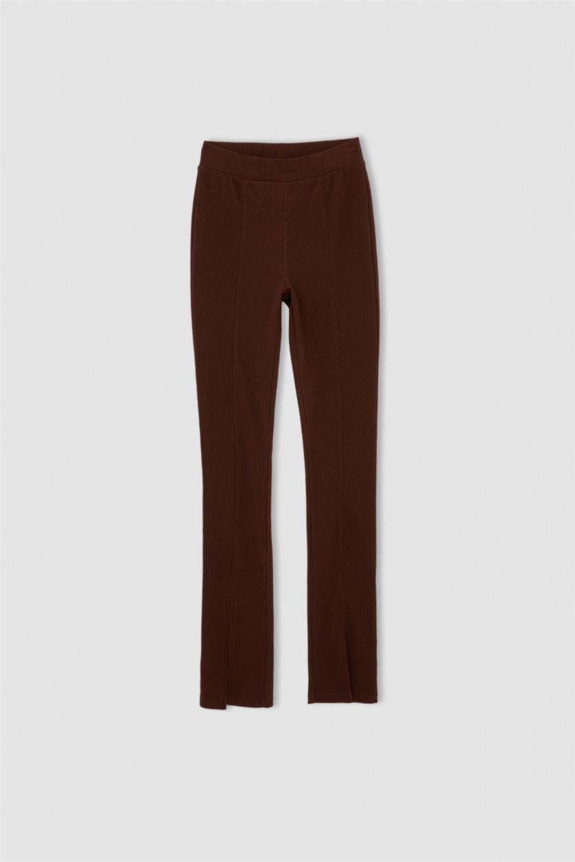 نساء بني بنطلون ضيق ضيق بخصر مرتفع مزين بفتحة