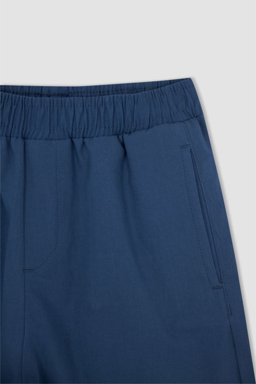 أولاد نيلي فاتح بنطلون كتان بيزك ولادي بالون فيت بقصة مستقيمة مفصل بجيب