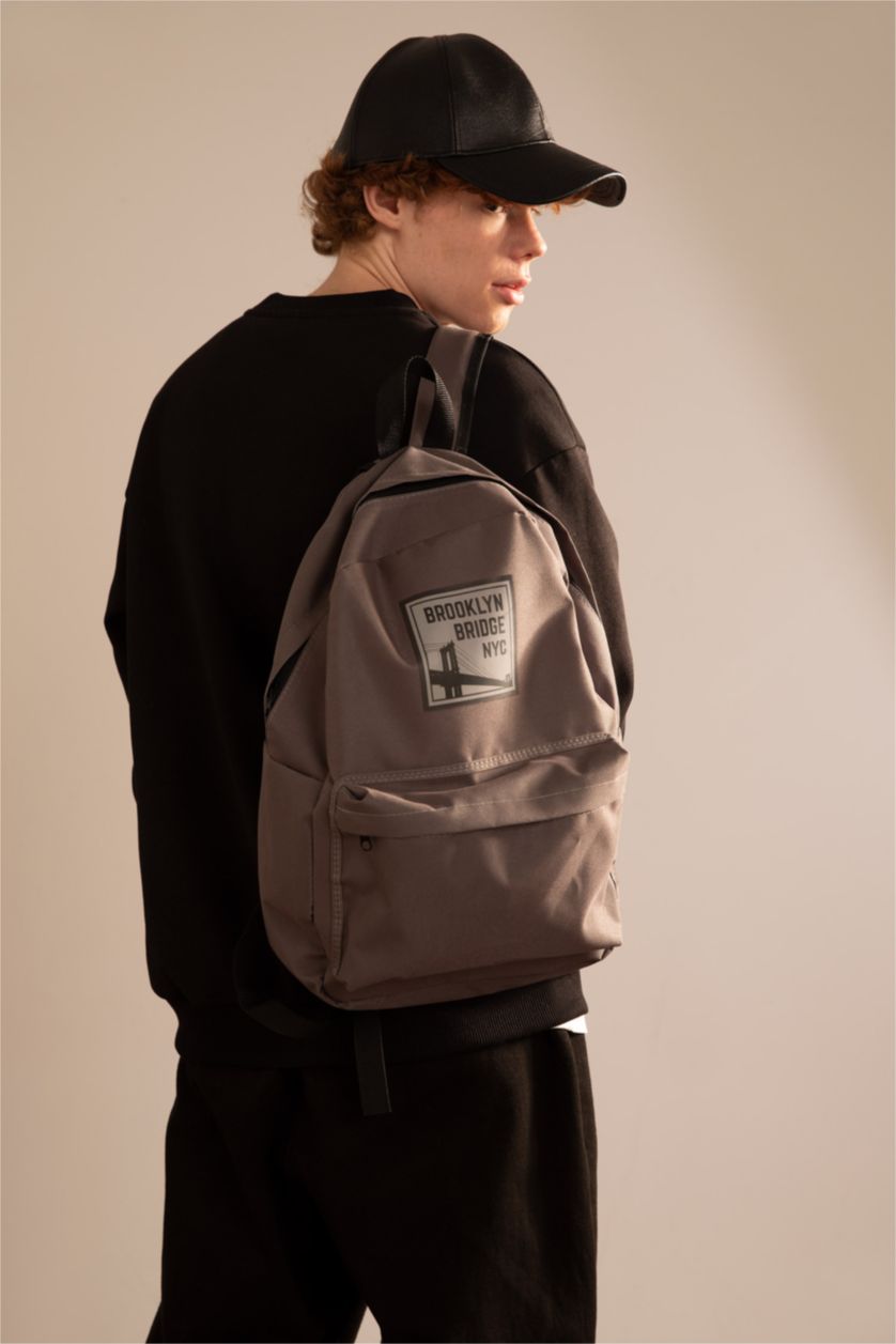 MAN Grey Unisex Text Printed Large School Backpack