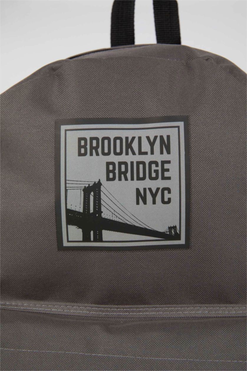 MAN Grey Unisex Text Printed Large School Backpack