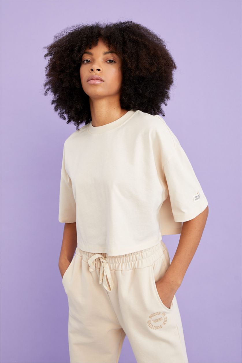 FEMME Beige Clair Defacto Fit T-shirt de sport court en coton biologique à col ras du cou coupe oversize