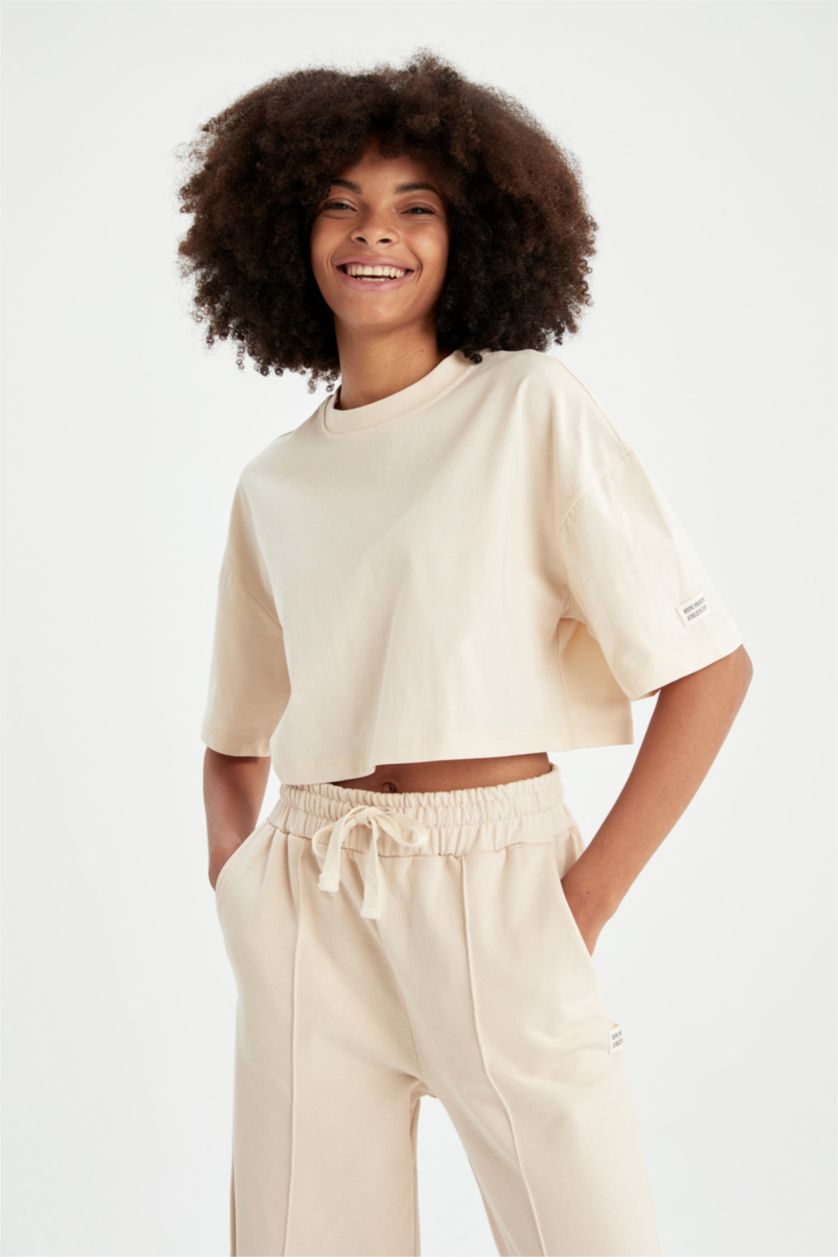 FEMME Beige Clair Defacto Fit T-shirt de sport court en coton biologique à col ras du cou coupe oversize