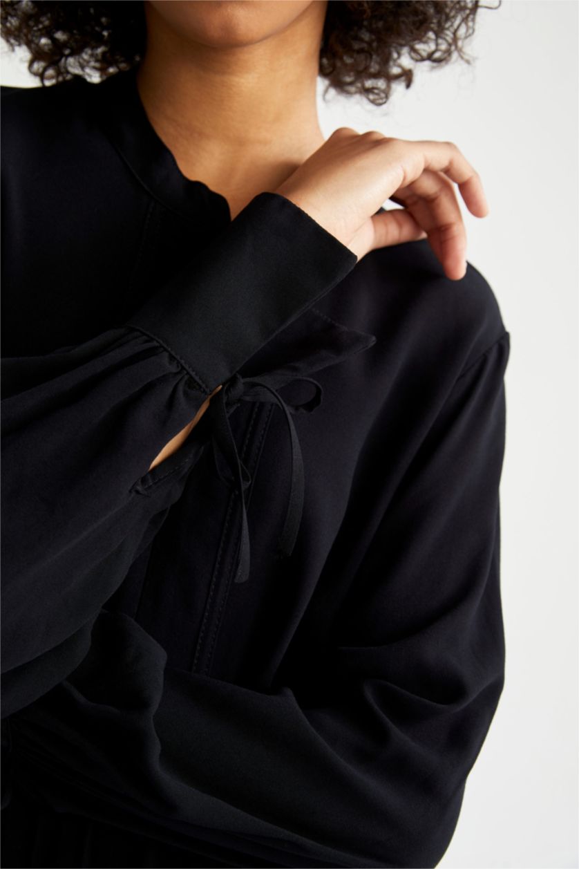 FEMME Noir Robe tissée à manches longues et col rond coupe classique