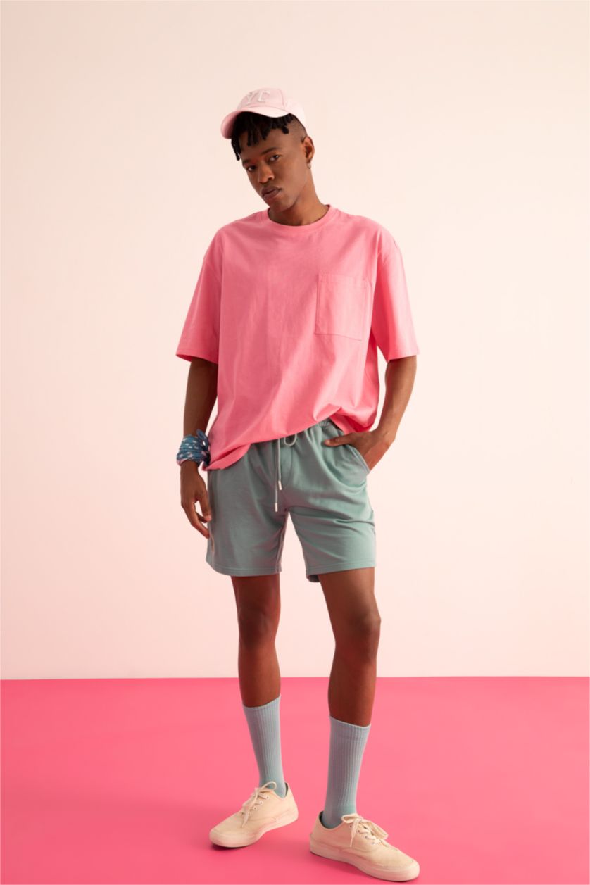 HOMME Vert Short coupe slim en tissu fin avec poche