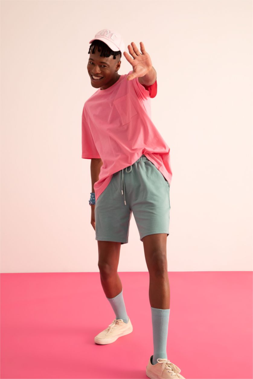 HOMME Vert Short coupe slim en tissu fin avec poche