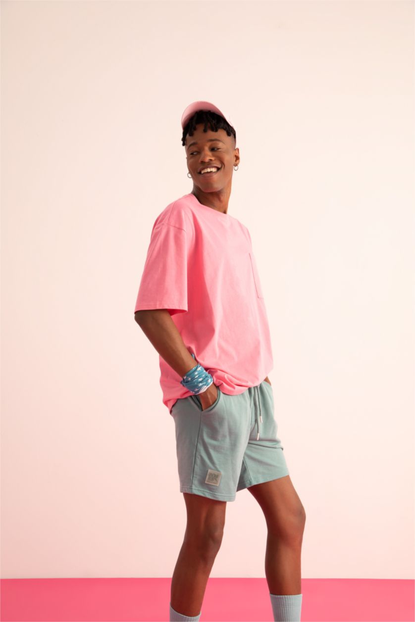 HOMME Vert Short coupe slim en tissu fin avec poche