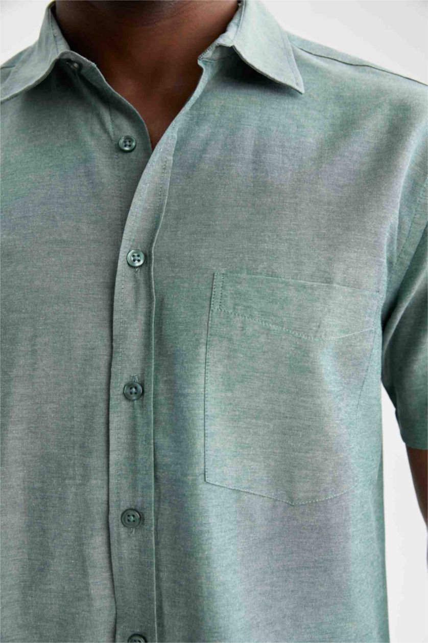 رجالي أخضر غامق قميص بولو بقصة عادية وأكمام قصيرة